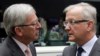 Eurogrupo reuniu ontem no Luxemburgo e, de novo, esta manhã. Jean-Claude Juncker (à esquerda) com Olli Rehn no domingo