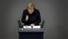 "Todo o mundo está a olhar para esta votação", disse Angela Merkel