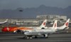 Aviões da Air China na pista do aeroporto internacional de Pequim