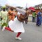 Trinidad e Tobago, 01.08.2011 | Uma turista americana participa nas danças de rua que fazem parte da celebração do Dia da Emancipação (que assinala a libertação dos escravos) em Porto de Espanha, capital daquele país do Caribe