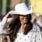 Na visita ao Canadá, Kate usou um chapéu de cowboy, oferecido na recepção do governo canadiano 