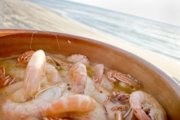 Lagostas e santolas numa praia a desaparecer: Arroz de Marisco