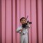 Um pequeno violinista de Rason. 