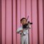 Um pequeno violinista de Rason.