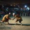 Irão, Teerão, 16.09.2011 | Dois nómadas iranianos Ghashghai enfrentam-se num jogo chamado Dorna Bazi, durante um festival dos pastores nómadas no norte de Teerão. Todos os anos, os Ghashghai, que habitam em Fars na província do Sul Isfahan, escapam à estação quente viajando com os seus rebanhos para zonas mais propícias junto ao Golfo Pérsico. 