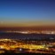 Lua Crescente com o disco apenas 1% iluminado. Imagem obtida nos Capuchos, Almada. É possível ver ainda a Costa da Caparica e parte de Lisboa e o Atlântico. 