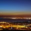 Lua Crescente com o disco apenas 1% iluminado. Imagem obtida nos Capuchos, Almada. É possível ver ainda a Costa da Caparica e parte de Lisboa e o Atlântico.