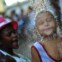 BRASIL. Um duche em plena festa, na favela do Morro do Tuiuti, organizada pela polícia e residentes.  