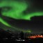 Aurora boreal vista a 25 de Janeiro de 2012 em Tromsoe, Noruega 