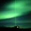 Aurora Austral com raio luminoso (do LIDAR - Complex Light Detection and Ranging - na estação de Davis, na Antárctida - o LIDAR é um sistema que mede distâncias através do seu feixe luminoso).