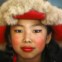 NEPAL, 06.07.2012. Uma rapariga posa em trajes tradicionais durante as celebrações dos 77 anos do Dalai Lama. Em Kathmandu.