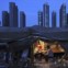  CHINA, 02.08.2012. Um trabalhador janta na sua barraca no local de construção de um complexo residencial dem Hefei. 