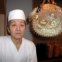 O chef de sushi Juntaro Takagi posa com um 