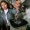 A cozinheira Bertha Piranes prepara uma bebida especial num mercado de San Juan de Lurigancho, Lima,   Peru,que inclui um sapo... Os fãs de tal mistura acreditam que cura doenças várias, de cansaço a impotência sexual.