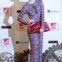 Pixie Geldof num vestido House of Holland, com carteira Margiela para a H&M