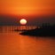 Argentina, 20.11.2012. O nascer do Sol junto às margens do rio de La Plata, em Buenos Aires