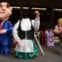 FRANÇA, 12.02.2013. No Carnaval de Nice. Um trabalhador carrega a cabeça de uma figura gigante que representa Angela Merkel para ao pé da figura do primeiro-ministro francês, Hollande. 