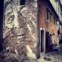 Primeiras artes do Memmo Alfama: rosto mural em arte de rua assinada por Alexandre Farto (aka Vhils)