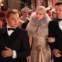 Carey Mulligan, no papel de Daisy, acompanhada por Leonardo DiCaprio como Jay Gatsby e o actor Joel Edgerton, que faz de seu marido no filme