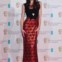 Olga Kurylenko a vestir Burberry