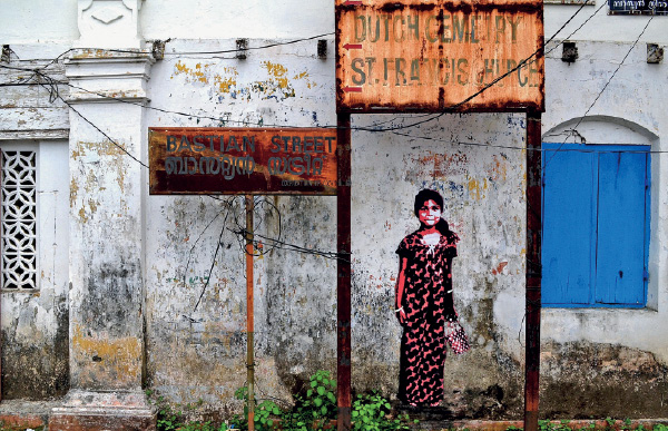 Graff iti na Bastion Street,
junto à Basílica de Santa
Cruz. Na Jacob Road, ao
lado, tal como na Bazaar
Road, dezenas de graff iti
evocam temas culturais
do passado e do presente
de Fort Kochi