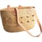 Cesta Ten Thousand Villages com alças em couro (cerca de 35€ no site da marca).