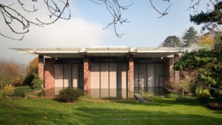 Front view of one of the Museum buildings of Beyeler Foundation as seen from the garden�