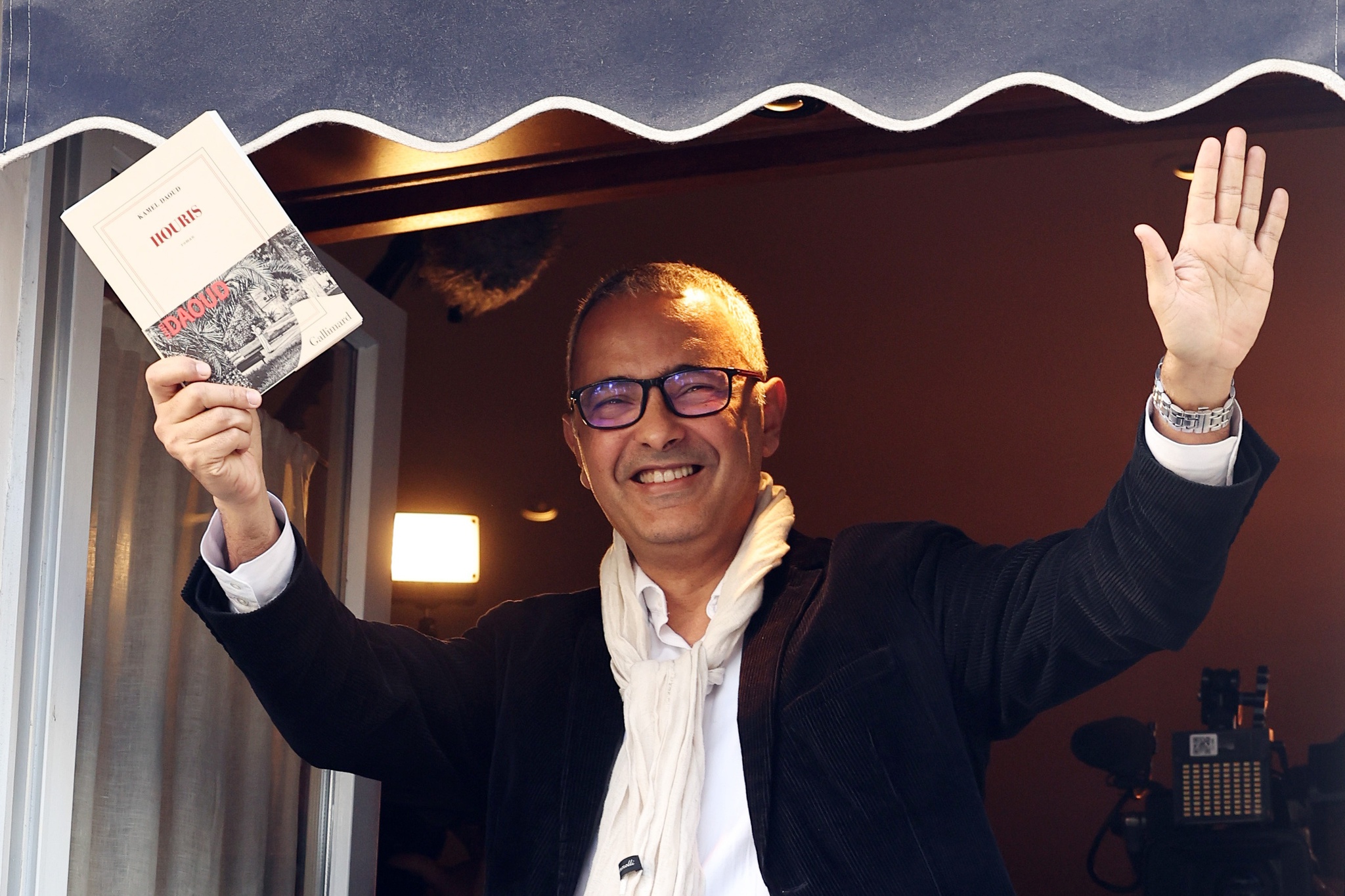 epa11700775 Algerian writer Kamel Daoud celebrates at the Drouant restaurant after winning the Goncourt Literary Prize 2024 for his book 'Houris' in Paris, France, 04 November 2024. The Prix Goncourt is given annually to an author by the French literary organization 'Societe litteraire des Goncourt' (Academie Goncourt). EPA/CHRISTOPHE PETIT TESSON