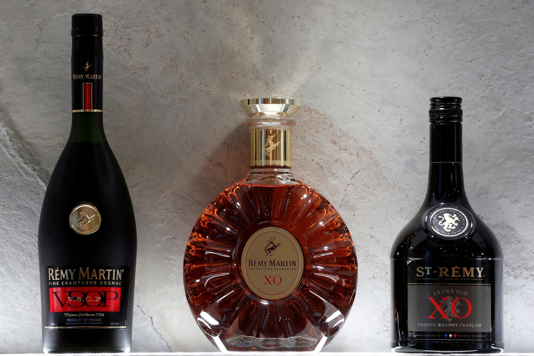 FILE PHOTO: Bottles of Remy Martin VSOP cognac, Remy Martin XO cognac and St-Remy XO Brandy are displayed at the Remy Cointreau SA headquarters in Paris, France, January 21, 2019. REUTERS/Benoit Tessier/File Photo