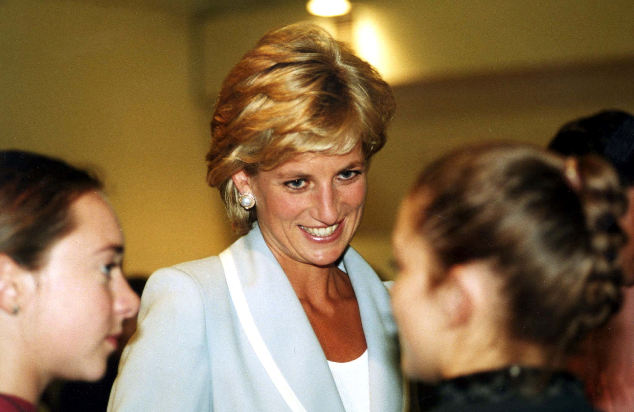 FILE PHOTO: Diana, Princess of Wales, speaks with dancers at the studios of the English National Ballet August 28 on the day that her marriage to the Prince of Wales officially came to an end with the issue of a decree absolute ./File Photo
NARCH/NARCH30