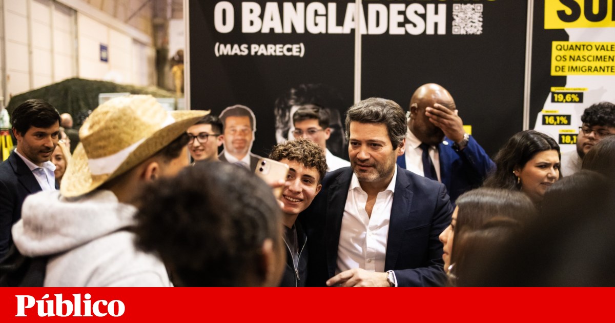 Education fair hosts Chega stand with anti-immigration posters linked to the 'Great Replacement' theory