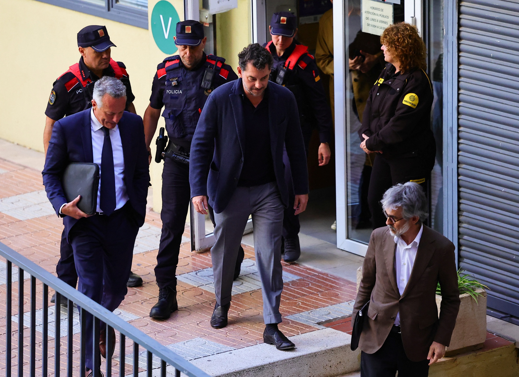 Jonathan Andic, the son of the founder of the Mango fashion group, Isak Andic, leaves the courthouse after posting bail, where he was questioned after being detained in an investigation of the death of his father, who was killed in a fall from a cliff near Barcelona in December 2024, in Martorell, Spain, May 19, 2026. REUTERS/stringer